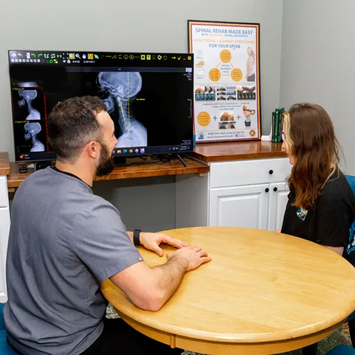 Chiropractor Lombard Jim Sronkoski With Patient Xray