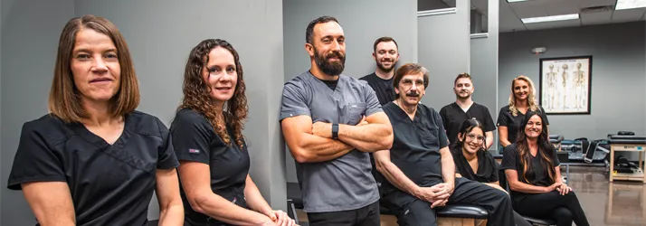 Chiropractor Lombard IL Jim Sronkoski With Team